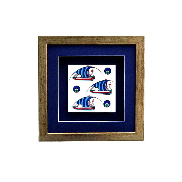 Depictions of sailing ships on framed iznik tile